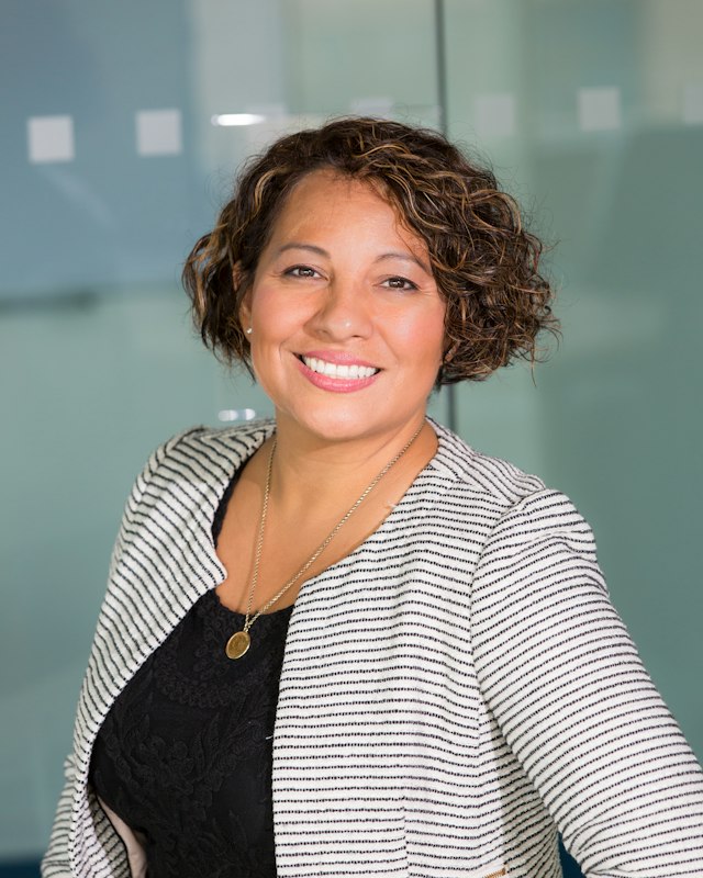 Accountant smiling in her office
